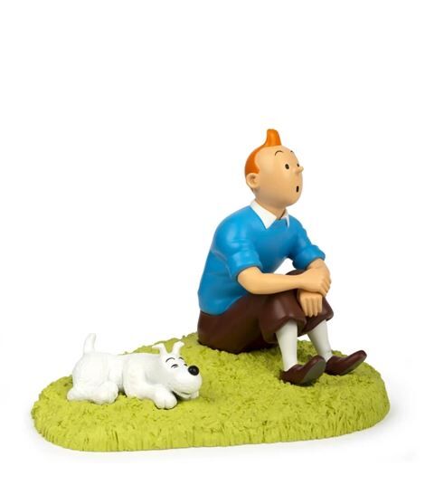 Figura de coleccon de resina Tintin sentado en la hierba